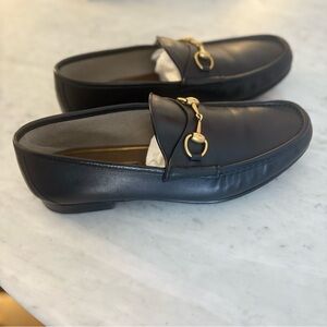 Gucci Men’s Black Leather Loafers with Gold Accents